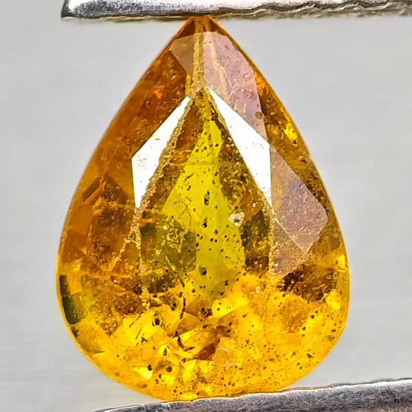 Natural Yellow Sapphire 1.29 Ct. Pear Shape 7.8 x 5.8 Mm Gemstone From Thailand: Product ID: 806162552 Product Name: Natural Yellow Sapphire Weight: 1.29 CT. Size: 7.8 x 5.8 x 3.7 MM. Shape: Pear Shape Color: Yellow Clarity:VSI - SI1 Luster: Good Gems Origin: Thailand Treatment: T
