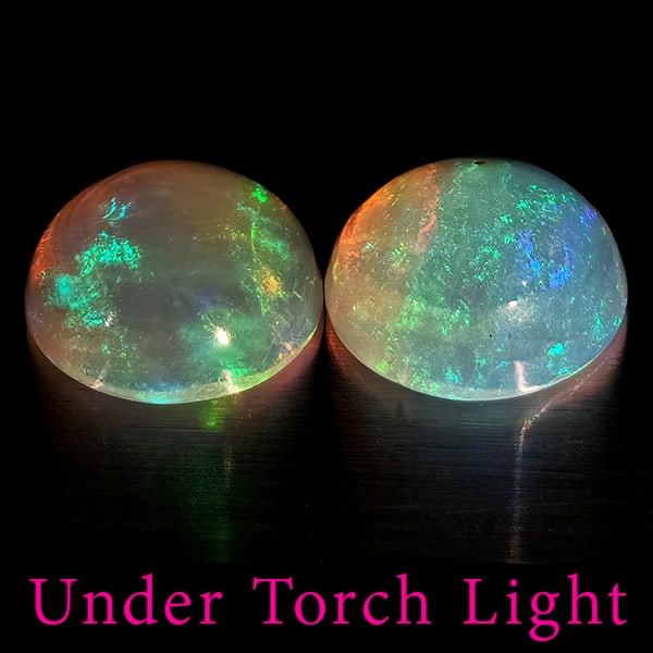 Natural Multi Color Opal 1.47 Ct. 2 Pcs Round Cabochon Shape 7 Mm Gemstones From Ethiopia: Product ID: 818728267 Product Name: Natural Opal Weight: 1.47 CT. Size: 7 x 7 x 3.2 MM. Shape: Round Color: Multi-Color Clarity:Semi - Transparent Luster: Good Gems Origin: Ethiopia Treatment: Unheate