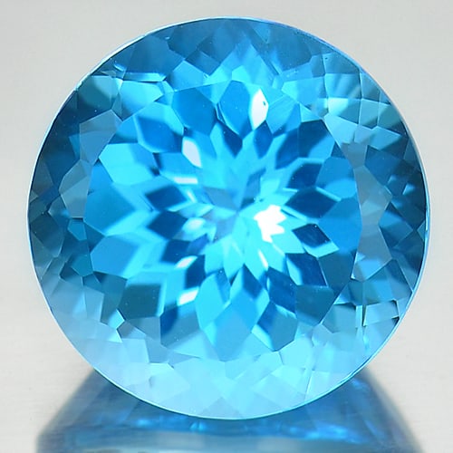 Natural Swiss Blue Topaz 15.85 Ct. Round Cornflower Cut 15 Mm Gemstone From Brazil: Product ID: 807166774 Product Name: Natural Blue Topaz Weight: 15.85 CT. Size: 15 x 15 x 10.3 MM. Shape: Round Color: Blue Clarity:IF Luster: Good Gems Origin: Brazil Treatment: Treated Crystal Struct