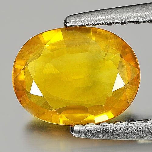 Natural Yellow Sapphire 1.17 Ct. Oval Shape 8 x 6 Mm. Gemstone From Thailand: Product ID: 806151059 Product Name: Natural Yellow Sapphire Weight: 1.17 CT. Size: 8 x 6 x 2.4 MM. Shape: Oval Color: Yellow Clarity:VSI Luster: Good Gems Origin: Thailand Treatment: Heated Crystal St