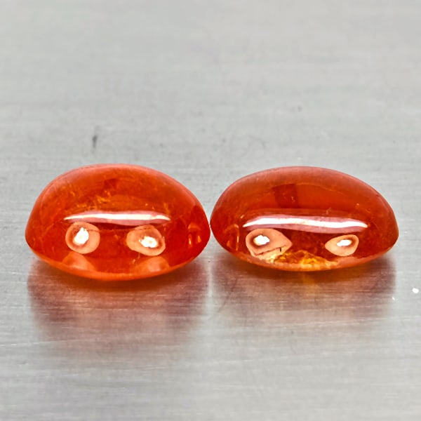Natural Orangish Red Spessartine Garnet 12.94 Ct. 2 Pcs Oval Cabochon Shape Gemstones From Namibia: Product ID: 802937987 Product Name: Natural Garnet Weight: 12.94 CT. Size: 11.4 x 9.4 x 6.3 MM. Shape: Oval Cabochon Color: Orangish Red Clarity:SI1 Luster: Good Gems Origin: Namibia Treatment: Unheat