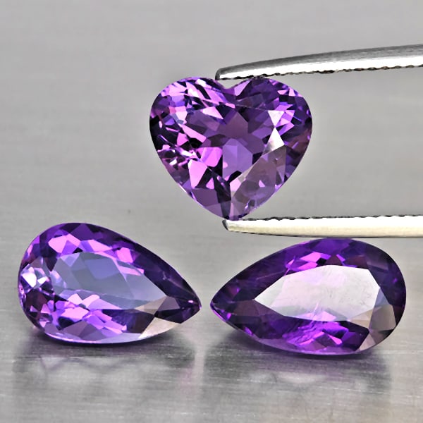 Natural Purple Amethyst 9.28 Ct. 3 Pcs Mixed Shape Gemstone From Brazil: Product ID: 800325686 Product Name: Natural Amethyst Weight: 9.28 CT. Size: 13 x 8 x 5.6 to 10.7 x 9.3 x 6.3 MM. Shape: Mixed Shape Color: Purple Clarity:SI1 Luster: Good Gems Origin: Brazil Treatment