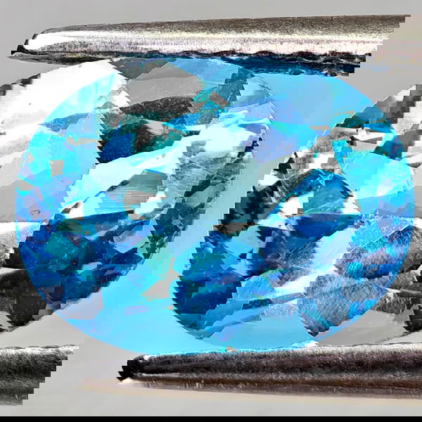 Natural Swiss Blue Topaz 2.40 Ct. Oval Shape 9.2 x 7.1 Mm Gemstone From Brazil: Product ID: 807168163 Product Name: Natural Blue Topaz Weight: 2.40 CT. Size: 9.2 x 7.1 x 4.9 MM. Shape: Oval Shape Color: Swiss Blue Clarity:VVS - VSI Luster: Good Gems Origin: Brazil Treatment: Trea