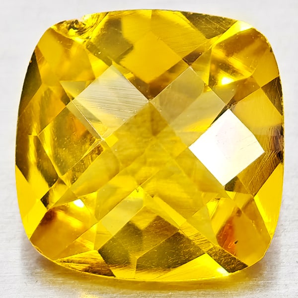 Natural Yellow Citrine 3.31 Ct. Cushion Checkerboard Cut 10.1 Mm. Gemstone from Brazil: Product ID: 801815156 Product Name: Natural Citrine Weight: 3.31 CT. Size: 10.1 x 10.1 x 5.9 MM. Shape: Cushion Checkerboard Cut Color: Yellow Clarity:VVS - VSI Luster: Good Gems Origin: Brazil Treatm