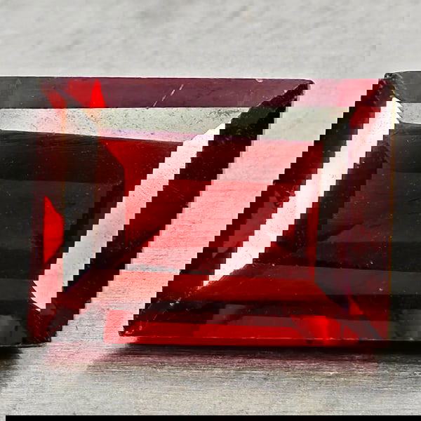Natural Orangish Red Garnet 1.72 Ct. Baguette Shape 7.8 x 5.8 Mm Gemstone from Tanzania: Product ID: 802937030 Product Name: Natural Red Garnet Weight: 1.72 CT. Size: 7.8 x 5.8 x 3.6 MM. Shape: Baguette Color: Orangish Red Clarity:VSI - SI1 Luster: Good Gems Origin: Tanzania Treatment: Un