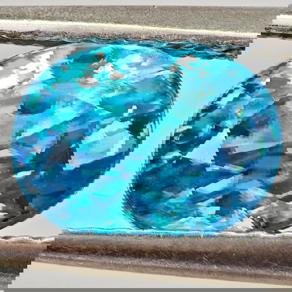 Natural Blue Zircon 2.27 Ct. Oval Shape 7.6 x 5.8 Mm Gemstone From Cambodia: Product ID: 807743017 Product Name: Natural Zircon Weight: 2.27 CT. Size: 7.6 x 5.8 x 5.1 MM. Shape: Oval Color: Blue Clarity:VSI - SI1 Luster: Good Gems Origin: Cambodia Treatment: Heated Crystal Str