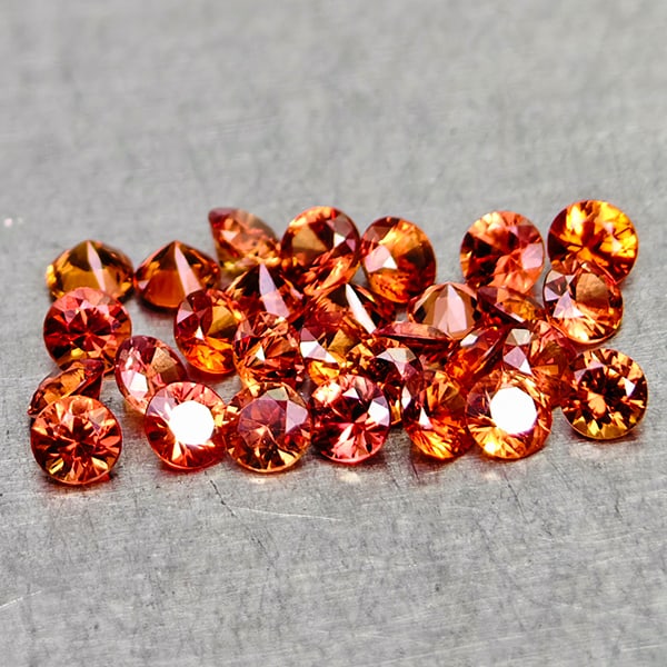 Natural Orange Red Songea Sapphire 1.05 Ct. 29 Pcs Round Diamond Cut 2 Mm Gemstone From Tanzania: Product ID: 806162089 Product Name: Natural Orange Sapphire Weight: 1.05 CT. Size: 2 x 2 x 1.4 MM. Shape: Round Diamond Cut Color: Orange Red Clarity:VSI Luster: Very Good Gems Origin: Tanzania Treatm