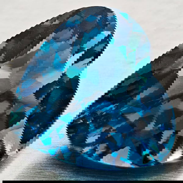 Natural London Blue Topaz 5.10 Ct. Heart Shape 10 x 9.5 Mm Gemstone From Brazil: Product ID: 807168386 Product Name: Natural Blue Topaz Weight: 5.10 CT. Size: 10 x 9.5 x 6 MM. Shape: Heart Shape Color: London Blue Clarity:VVS - VSI Luster: Good Gems Origin: Brazil Treatment: Treat