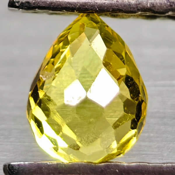 Natural Yellow Sapphire 0.39 Ct. Biolette Shape 3.4 x 3 Mm Gemstone from Thailand: Product ID: 106101234 Product Name: Natural Yellow Sapphire Weight: 0.39 CT. Size: 3.4 x 3 x 3 MM. Shape: Biolette Color: Yellow Clarity:IF Luster: Good Gems Origin: Thailand Treatment: Heated Crystal
