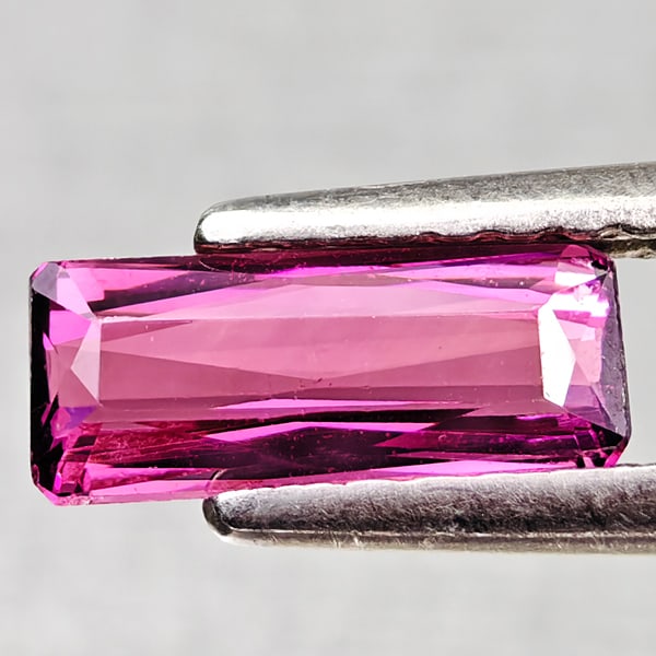 Natural Party Color Pink Tourmaline 0.66 Ct. Octagon Shape 8.2 x 3.4 Mm Gemstone from Nigeria: Product ID: 807250545 Product Name: Natural Tourmaline Weight: 0.66 CT. Size: 8.2 x 3.4 x 2.6 MM. Shape: Octagon Color: Party Color Pink Clarity:VSI Luster: Good Gems Origin: Nigeria Treatment: Unheat
