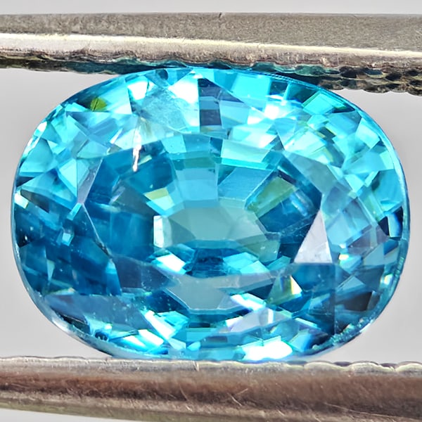 Natural Blue Zircon 2.57 Ct. Oval Shape 7.6 x 5.9 Mm Gemstone From Cambodia: Product ID: 807743025 Product Name: Natural Zircon Weight: 2.57 CT. Size: 7.6 x 5.9 x 5.2 MM. Shape: Oval Color: Blue Clarity:VSI - SI1 Luster: Good Gems Origin: Cambodia Treatment: Heated Crystal Str