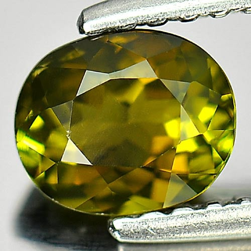 Natural Brownish Green Tourmaline 0.78 Ct. Oval Shape 6 x 5 Mm Gemstone from Nigeria: Product ID: 807246821 Product Name: Natural Tourmaline Weight: 0.78 CT. Size: 6 x 5 x 3.8 MM. Shape: Oval Color: Brownish Green Clarity:VSI Luster: Good Gems Origin: Nigeria Treatment: Unheated Crysta