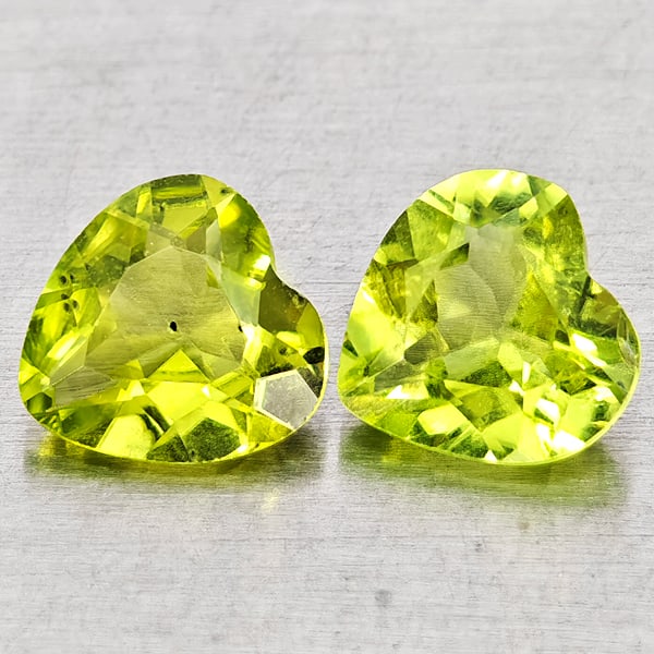 Natural Green Peridot 1.41 Ct. 2 Pcs Heart Shape 6 x 6 Gemstones from Pakistan: Product ID: 805317295 Product Name: Natural Peridot Weight: 1.41 CT. Size: 6 x 6 x 3.2 MM. Shape: Heart Shape Color: Green Clarity:VSI - SI1 Luster: Good Gems Origin: Pakistan Treatment: Unheated Crys