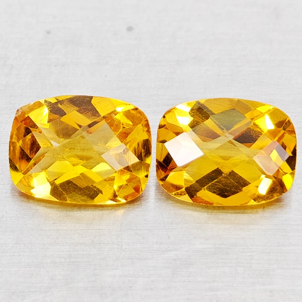 Natural Yellow Citrine 2.52 Ct. 2 Pcs Cushion Checkerboard Cut 8.1 x 6.3 Mm.Gemstones From Brazil: Product ID: 801815189 Product Name: Natural Citrine Weight: 2.52 CT. Size: 8.1 x 6.3 x 4.3 MM. Shape: Cushion Checkerboard Cut Color: Yellow Clarity:VVS - VSI Luster: Good Gems Origin: Brazil Treatmen