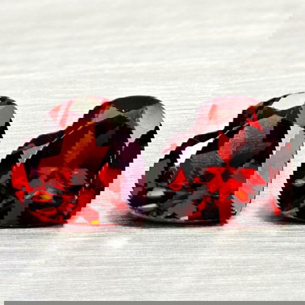 Natural Orangish Red Garnet 2.36 Ct. 2 Pcs Heart Shape 7.1 x 6.9 MM Gemstones From Tanzania: Product ID: 802936642 Product Name: Natural Red Garnet Weight: 2.36 CT. Size: 7.1 x 6.9 x 3.4 MM. Shape: Heart Shape Color: Orangish Red Clarity:VSI Luster: Good Gems Origin: Tanzania Treatment: Unhea