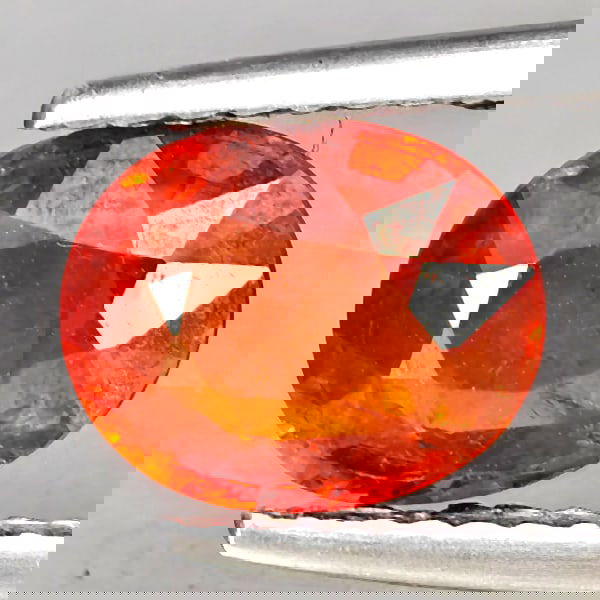 Natural Orangish Red Spessartine Garnet 2.01 Ct. Oval Shape 8.2 x 6.3 Mm Gemstones From Namibia: Product ID: 802937960 Product Name: Natural Garnet Weight: 2.01 CT. Size: 8.2 x 6.3 x 4 MM. Shape: Oval Color: Orangish Red Clarity:SI1 Luster: Good Gems Origin: Namibia Treatment: Unheated Crystal St
