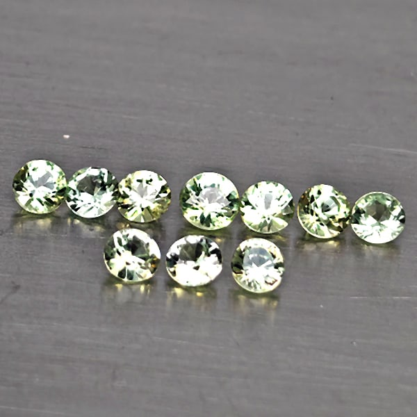 Natural Green Songea Sapphire 1.24 Ct. 10 Pcs Round Diamond Cut 3.1 Mm Gemstone from Tanzania: Product ID: 806130516 Product Name: Natural Blue Sapphire Weight: 1.24 CT. Size: 3.1 x 3.1 x 2.1 MM. Shape: Round Diamond Cut Color: Green Clarity:VSI Luster: Good Gems Origin: Tanzania Treatment: Hea