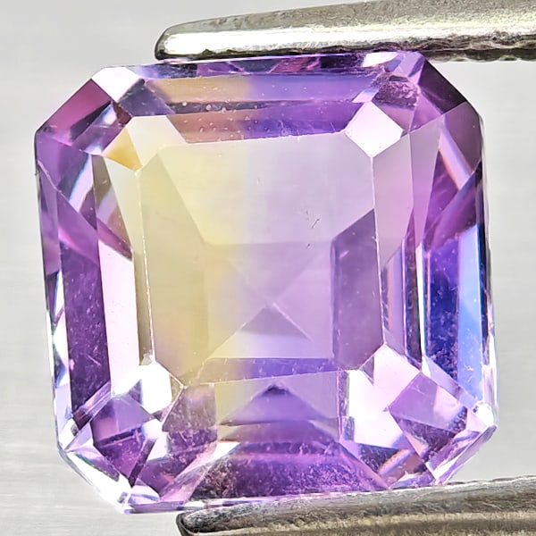 Natural Bi Color Ametrine 2.56 Ct. Octagon Shape 8 x 7.9 Mm Gemstone from Bolivia: Product ID: 800408383 Product Name: Natural Ametrine Weight: 2.56 CT. Size: 8 x 7.9 x 5.6 MM. Shape: Octagon Color: Bi Color Clarity:VSI Luster: Good Gems Origin: Bolivia Treatment: Unheated Crystal S
