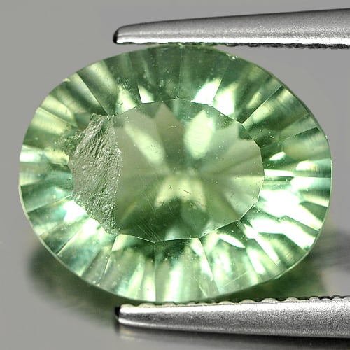 Natural Green Fluorite 4.33 Ct. Oval Concave Cut 12.1 x 10 Mm. Unheated Gemstone (1 of 3)