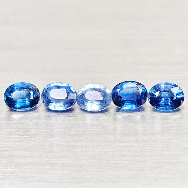Natural Blue Kyanite 2.10 Ct. 5 Pcs Oval Shape 5.1 x 4.1 Mm. Gemstone From Sri - Lanka: Product ID: 804204841 Product Name: Natural Kyanite Weight: 2.10 CT. Size: 5.1 x 4.1 x 2.7 MM. Shape: Oval Color: Blue Clarity:VSI - SI1 Luster: Good Gems Origin: Sri - Lanka Treatment: Unheated Cryst