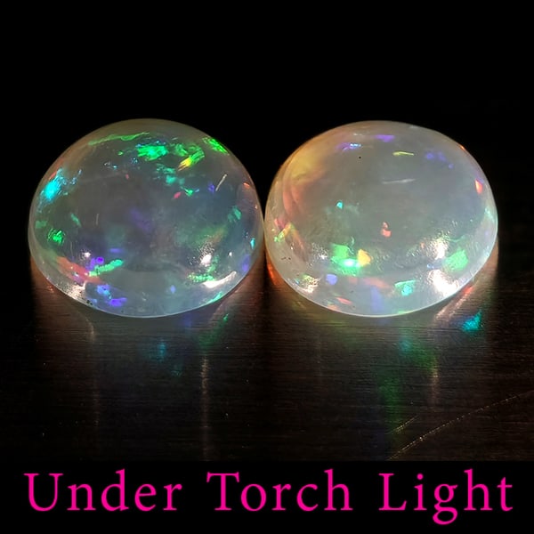 Natural Multi Color Opal 1.58 Ct. 2 Pcs Round Cabochon Shape 7.1 Mm Gemstones From Ethiopia: Product ID: 818728222 Product Name: Natural Opal Weight: 1.58 CT. Size: 7.1 x 7.1 x 3.3 MM. Shape: Round Color: Multi-Color Clarity:Semi - Transparent Luster: Good Gems Origin: Ethiopia Treatment: Unh