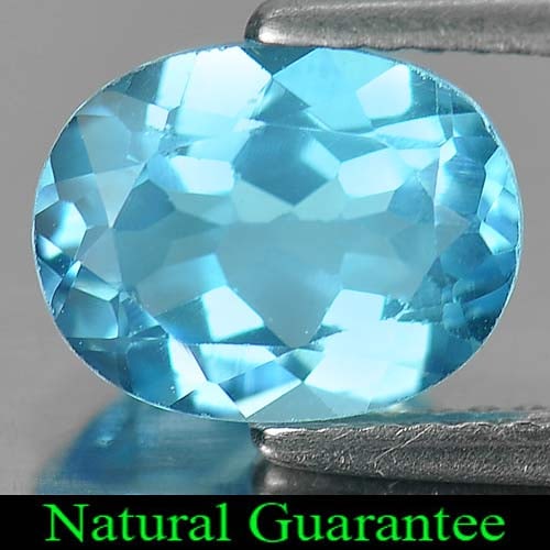 Natural Swiss Blue Topaz 2.35 Ct. Oval Shape 9 x 7 Mm Gemstone From Brazil: Product ID: 807161365 Product Name: Natural Blue Topaz Weight: 2.35 CT. Size: 9 x 7 x 4.5 MM. Shape: Oval Color: Swiss Blue Clarity:VSI Luster: Good Gems Origin: Brazil Treatment: Treated Crystal Stru