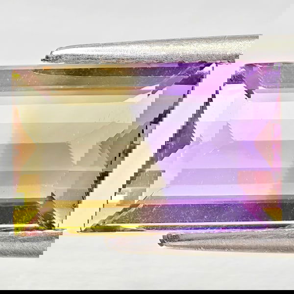 Natural Bi Color Ametrine 3.42 Ct. Octagon Shape 11 x 7.1 Mm Gemstone From Bolvia: Product ID: 800408415 Product Name: Natural Ametrine Weight: 3.42 CT. Size: 11 x 7.1 x 5.3 MM. Shape: Octagon Color: Bi Color Clarity:VSI - SI1 Luster: Good Gems Origin: Bolivia Treatment: Unheated Cr