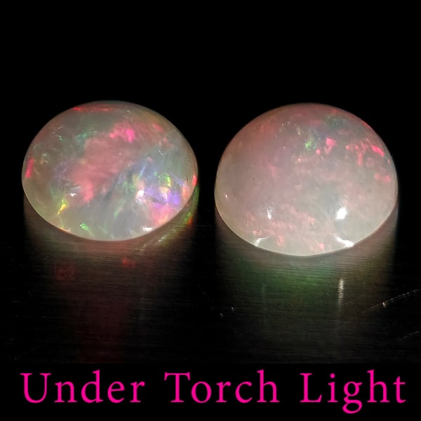 Natural Multi Color Opal 1.52 Ct. 2 Pcs Round Cabochon Shape 7.2 Mm Gemstones From Ethiopia: Product ID: 818728251 Product Name: Natural Opal Weight: 1.52 CT. Size: 7.2 x 7.2 x 3.5 MM. Shape: Round Cabochon Color: Multi-Color Clarity:Semi - Transparent Luster: Good Gems Origin: Ethiopia Treat