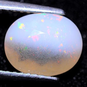 Natural Multi Color Opal 1.73 Ct. Oval Shape 9.6 x 7.8 Mm Gemstone from Ethiopia (1 of 3)