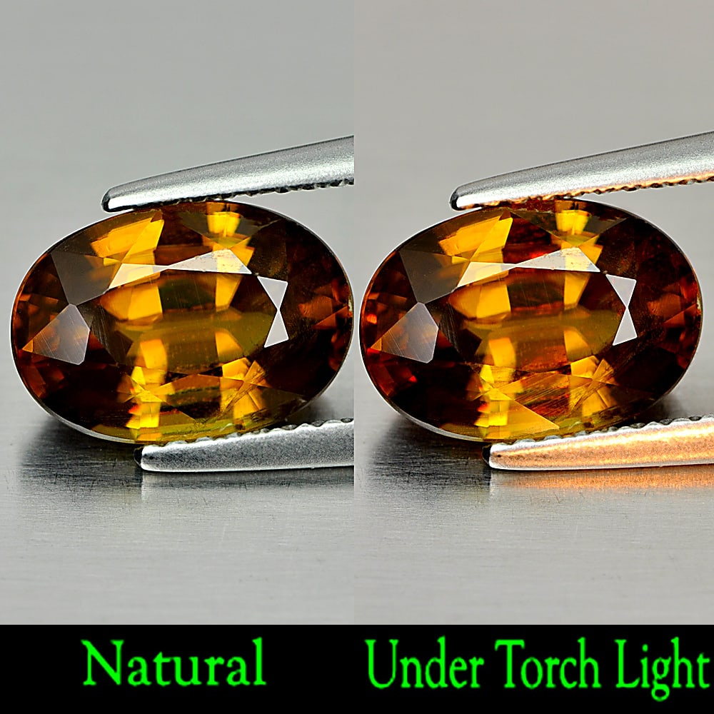 Natural Multi-Color Sphene 2.91 Ct. Oval Shape 10.3 x 7.2 Mm. Gemstone from Madagascar: Product ID: 806508018 Product Name: Natural Sphene Weight: 2.91 CT. Size: 10.3 x 7.2 x 4.9 MM. Shape: Oval Color: Multi-Color With Rainbow Spark Clarity:VSI Luster: Adamantine Gems Origin: Madagascar