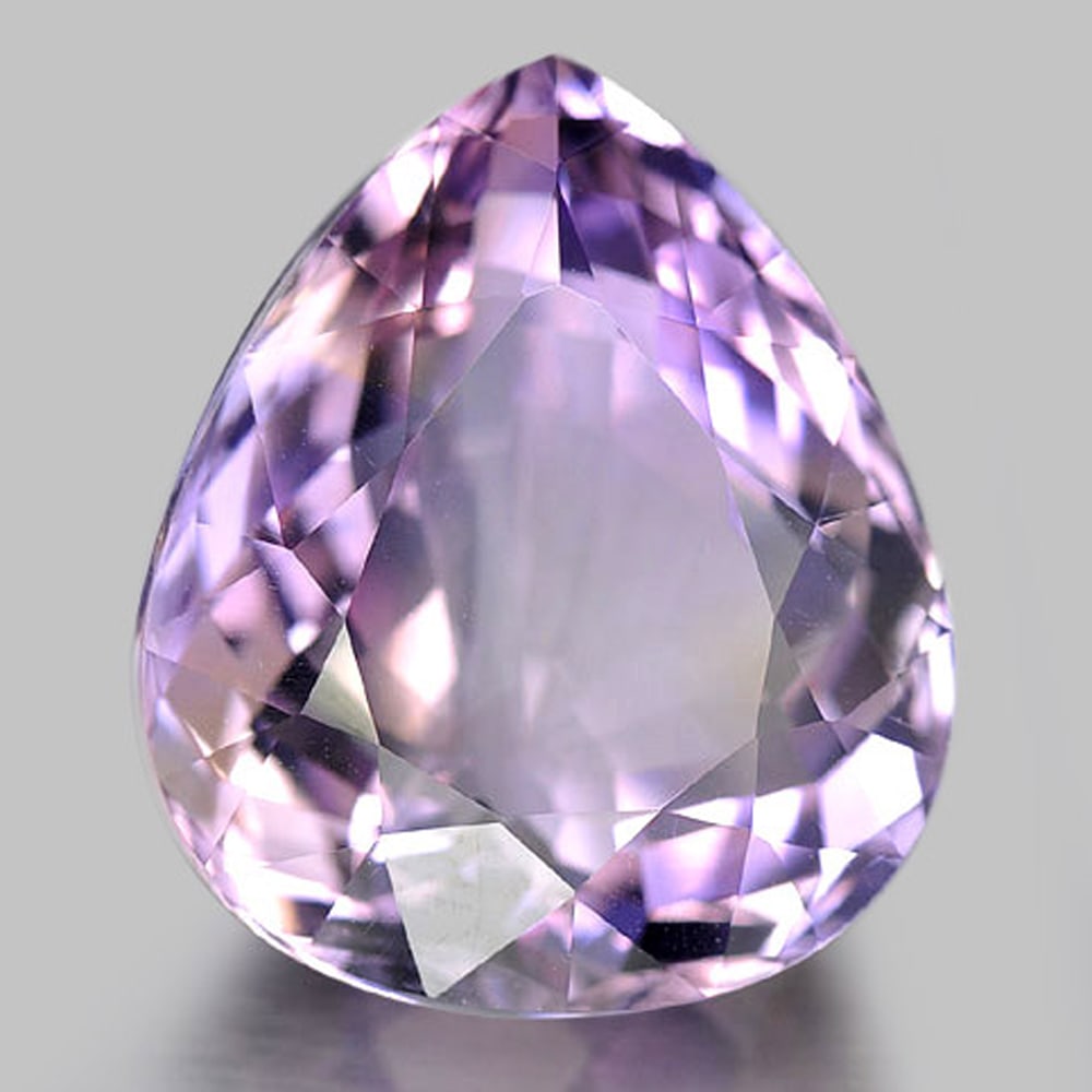 Natural Bi Color Ametrine 21.62 Ct. Pear Shape 20.3 x 17.2 Mm Gemstone from Bolivia: Product ID: 800407448 Product Name: Natural Ametrine Weight: 21.62 CT. Size: 20.3 x 17.2 x 10.8 MM. Shape: Pear Color: Bi-Color Clarity:IF Luster: Very Good Gems Origin: Bolivia Treatment: Unheated Cr