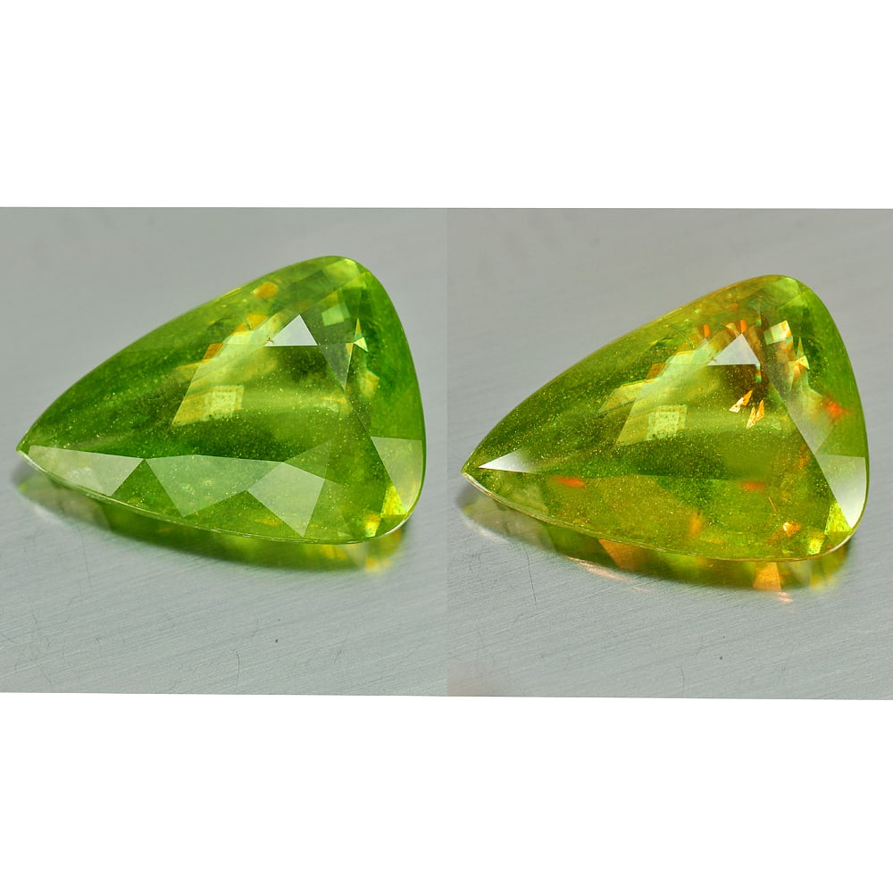 Natural Gemstone Intense Green Titanium Red Spark Sphene 24.25 Ct. Pear Shape 25 x 17.7 Mm Gemstone: Product ID: 806503830 Product Name: Natural Sphene Weight: 24.25 CT. Size: 25 x 17.7 x 7.5 MM. Shape: Pear Color: Green Clarity:SI1 Luster: Adamantine Gems Origin: Mardagascar Treatment: Unheated Crys