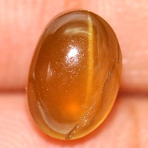 Natural Greenish Yellow Apatite 2.87 Ct. Oval Cabochon Shape 8.7 x 6.1 Mm Gemstone from Tanzania: Product ID: 800611090 Product Name: Natural Apatite Weight: 2.87 CT. Size: 8.7 x 6.1 x 5.9 MM. Shape: Oval Cabochon Color: Greenish Yellow Clarity:Semi - Transparent Luster: Good Gems Origin: Tanzania