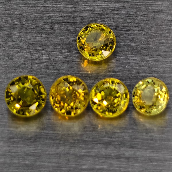 Natural Greenish Yellow Titanium Sphene Rainbow Spark 1.21 Ct. 5 Pcs Round Shape 4 Mm Gemstones from: Product ID: 806509356 Product Name: Natural Sphene Weight: 1.21 CT. Size: 4 x 4 x 2.5 MM. Shape: Round Shape Color: Greenish Yellow Titanium Ranibow Spark Clarity:SI1 Luster: Good Gems Origin: Madagas