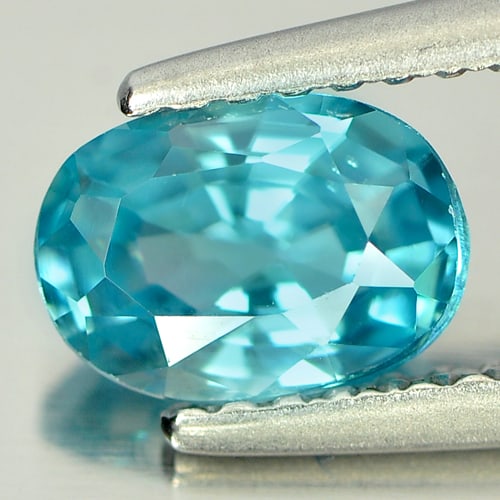 Natural Blue Zircon 1.29 Ct. Oval Shape 7 x 5 Mm. Gemstone From Cambodia: Product ID: 807721581 Product Name: Natural Zircon Weight: 1.29 CT. Size: 7 x 5 x 3.4 MM. Shape: Oval Color: Blue Clarity:VVS Luster: Good Gems Origin: Cambodia Treatment: Heated Crystal Structure: Te