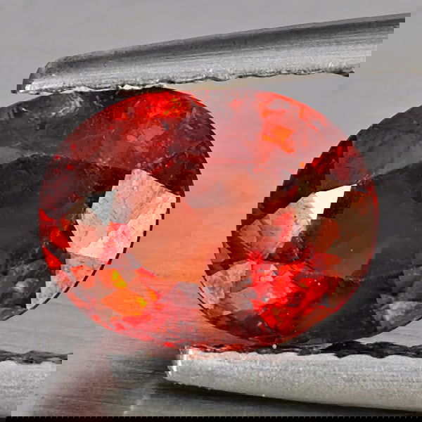 Natural Orangish Red Spessartine Garnet 1.73 Ct. Oval Shape 7.7 x 6 Mm Gemstones From Namibia: Product ID: 802937943 Product Name: Natural Garnet Weight: 1.73 CT. Size: 7.7 x 6 x 4.2 MM. Shape: Oval Color: Orangish Red Clarity:SI1 Luster: Good Gems Origin: Namibia Treatment: Unheated Crystal St