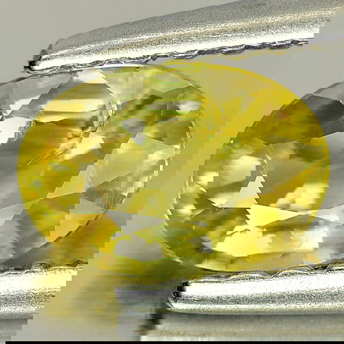 Natural Yellow Sapphire 0.65 Ct. Oval Shape 6.2 x 4.3 Mm Gemstone from Thailand (1 of 3)