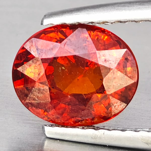 Natural Orangish Red Spessartine Garnet 2.15 Ct. Oval Shape 8.1 x 6.6 Mm Gemstones From Namibia: Product ID: 802937951 Product Name: Natural Garnet Weight: 2.15 CT. Size: 8.1 x 6.6 x 4.8 MM. Shape: Oval Color: Orangish Red Clarity:SI1 Luster: Good Gems Origin: Namibia Treatment: Unheated Crystal