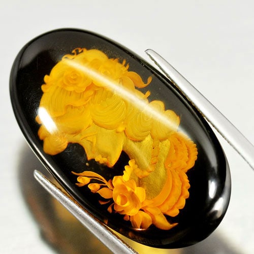 Natural Yellow Amber 13.00 Ct. Woman Caring Oval Cabochon Shape 31 x 17.8 Mm. Gemstone From Poland: Product ID: 819005251 Product Name: Natural Amber Weight: 13.00 CT. Size: 31 x 17.8 x 7 MM. Shape: Oval Cabochon Color: Yellow Clarity:Semi - Transparent Luster: Good Gems Origin: Poland Treatment: Un