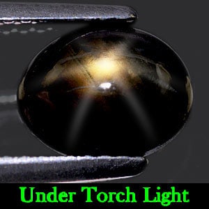 Natural Black Star Sapphire 2.73 Ct. Oval Cabochon Shape 8.6 x 6.9 Mm Gemstone from Thailand: Product ID: 806135348 Product Name: Natural Star Sapphire Weight: 2.73 CT. Size: 8.6 x 6.9 x 4.2 MM. Shape: Oval Cabochon Color: Black Clarity:Opaque Luster: Good 6 Rays Star Gems Origin: Thailand Tre