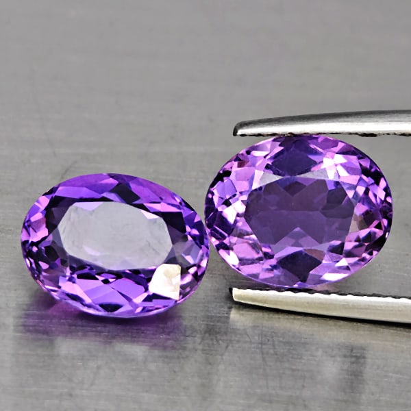 Natural Purple Amethyst 5.51 Ct. 2 Pcs Oval Shape 10.5 x 8.5 Mm Gemstone From Brazil: Product ID: 800325714 Product Name: Natural Amethyst Weight: 5.51 CT. Size: 10.5 x 8.5 x 5.8 MM. Shape: Oval Shape Color: Purple Clarity:VSI Luster: Good Gems Origin: Brazil Treatment: Unheated Crysta