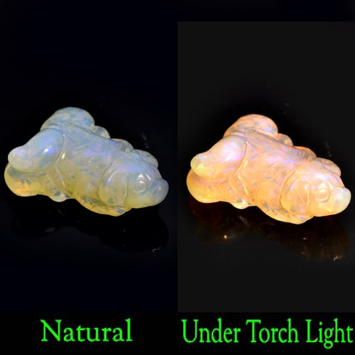 Natural Multi Color Opal 11.66 Ct. Dog Carving 21 x 14 x 7 Mm. Unheated Gemstone: Product ID: 818727145 Product Name: Natural Opal Carving Weight: 11.66 CT. Size: 21 x 14 x 7 MM. Shape: Dog Carving Color: Multi Color Clarity:Semi - Transparent Luster: Strong Iridescent Gems Origin: