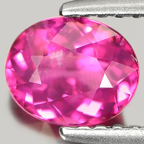 Natural Pink Tourmaline 0.86 Ct. Oval Shape 6.6 x 5.4 Mm. Gemstone from Nigeria: Product ID: 807226424 Product Name: Natural Tourmaline Weight: 0.86 CT. Size: 6.6 x 5.4 x 3.5 MM. Shape: Oval Color: Pink Clarity:VSI Luster: Good Gems Origin: Nigeria Treatment: Unheated Crystal Stru