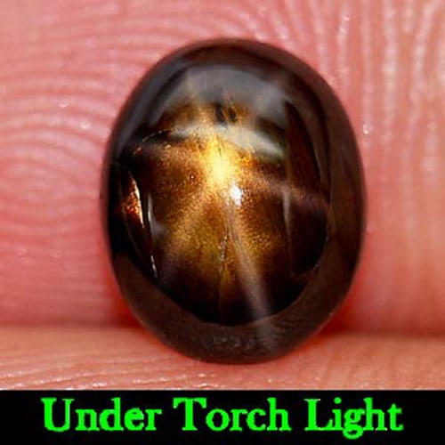 Certified Natural Golden Star Sapphire 1.70 Ct. Oval Cabochon Shape 6.23 x 7.65 Mm Gemstone From: Product ID: 806149960 Product Name: Natural Star Sapphire Weight: 1.70 CT. Size: 6.23 x 7.65 x 3.30 MM. Shape: Oval Cabochon Color: Yellow Clarity:Opaque Luster: Good 6 Ray Star Gems Origin: Thailand