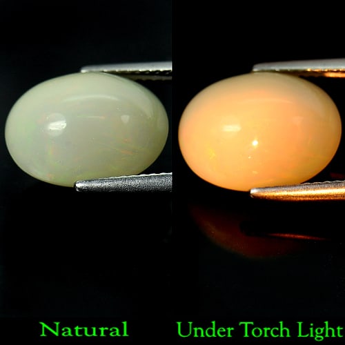 Natural Multi Color Opal 5.64 Ct. Oval Cabochon Shape 13.9 x 10.6 Mm Gemstone from Ethiopia: Product ID: 818708286 Product Name: Natural Opal Weight: 5.64 CT. Size: 13.9 x 10.6 x 8 MM. Shape: Oval Cabochon Color: Multi Color Clarity:Semi - Transparent Luster: Good Gems Origin: Ethiopia Treatm