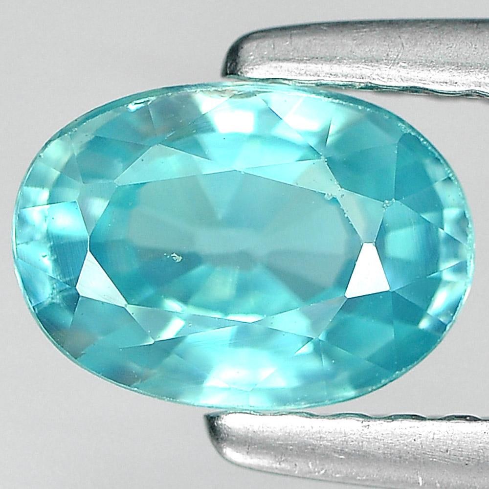 Natural Blue Zircon 1.25 Ct. Oval Shape 7 x 5 Mm. Gemstone From Cambodia: Product ID: 807730849 Product Name: Natural Zircon Weight: 1.25 CT. Size: 7 x 5 x 3.3 MM. Shape: Oval Color: Blue Clarity:VSI Luster: Good Gems Origin: Cambodia Treatment: Heated Crystal Structure: Te