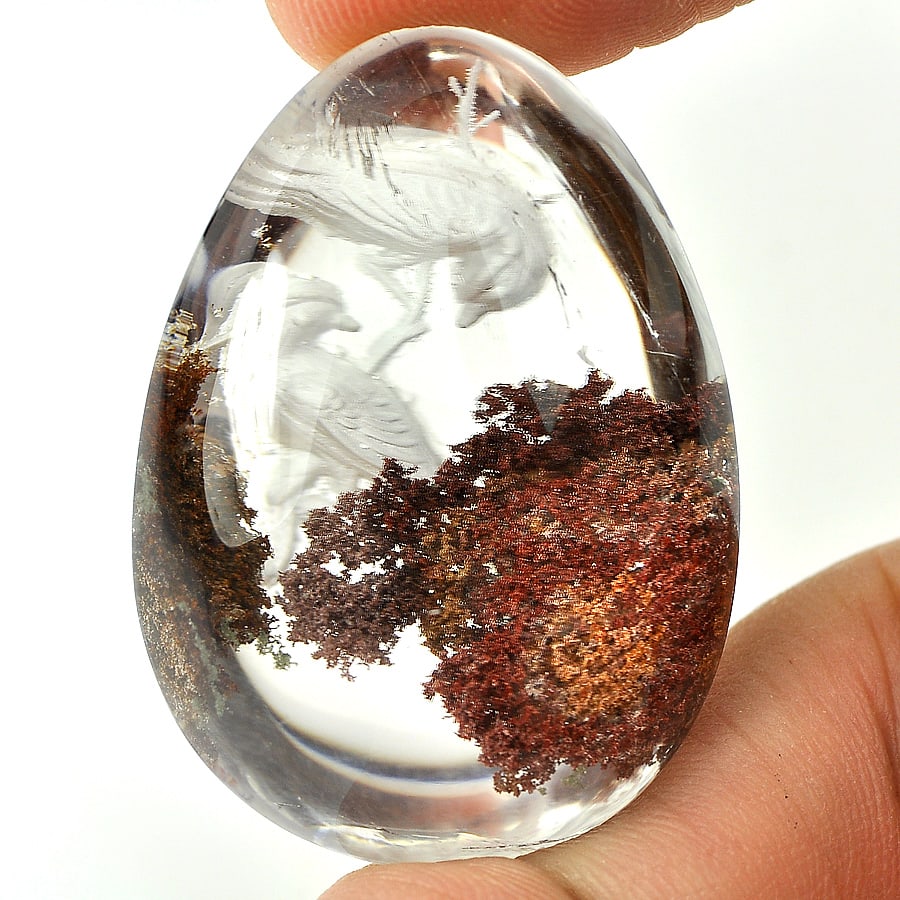 Natural Moss Quartz 75.00 Ct. Bird Carving Pear Cabochon Shape 34 x 24 Mm. Gemstone: Product ID: 805527018 Product Name: Natural Quartz Weight: 75.00 CT. Size: 34 x 24 x 18 MM. Shape: Pear Cabochon Color: White Clarity:Semi - Transparent Luster: Good Gems Origin: Thailand Treatment: U