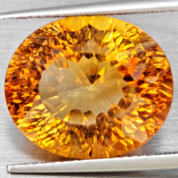 Natural Imperial Topaz 14.53 Ct. Oval Concave Cut 16 x 13.7 Mm Gemstone From Brazil: Product ID: 807168619 Product Name: Natural Topaz Weight: 14.53 CT. Size: 16 x 13.7 x 9.5 MM. Shape: Oval Shape Color: Imperial Clarity:VSI Luster: Good Gems Origin: Brazil Treatment: Treated Crystal