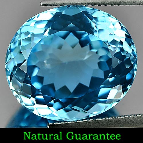 Natural Swiss Blue Topaz 23.05 Ct. Oval Shape 17.8 x 15.4 Mm Gemstone from Brazil: Product ID: 807158631 Product Name: Natural Blue Topaz Weight: 23.05 CT. Size: 17.8 x 15.4 x 10.8 MM. Shape: Oval Color: Swiss Blue Clarity:IF Luster: Very Good Gems Origin: Brazil Treatment: Treated