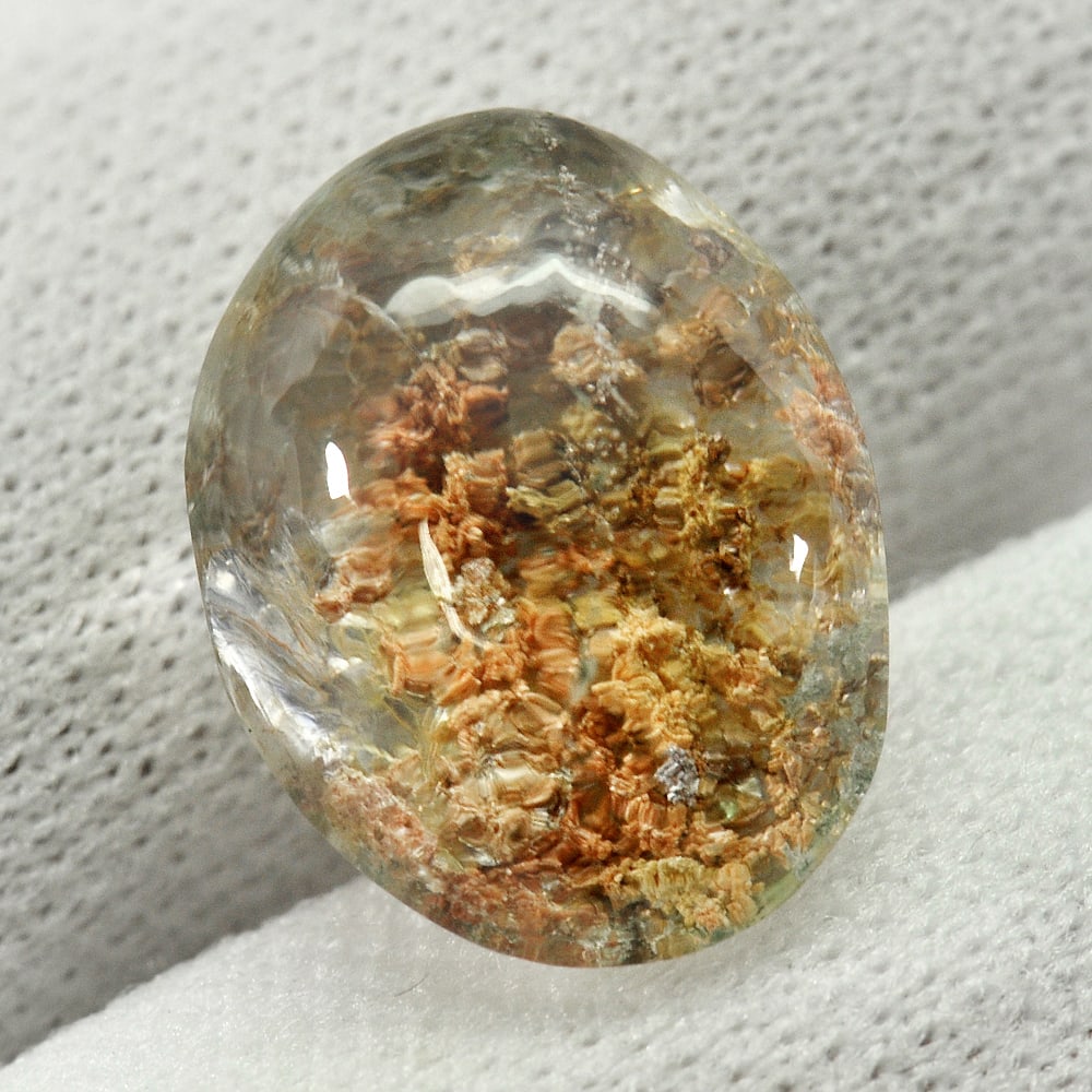 Natural White Brown Moss Quartz 7.00 Ct. Oval Cabochon Shape 14.2 x 11 Mm. Gemstone from Thailand: Product ID: 805529550 Product Name: Natural Quartz Weight: 7.00 CT. Size: 14.2 x 11 x 7.1 MM. Shape: Oval Cabochon Color: White Clarity:Semi - Transparent Luster: Good Gems Origin: Thailand Treatment: